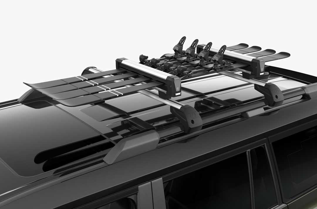 Close-up of Lexus GX roof carrying ski's with optional ski carrier accessory.