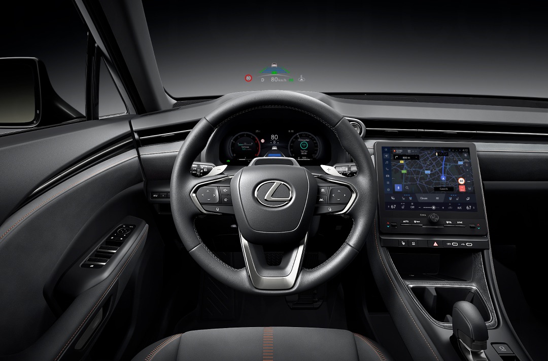 Driver's view of the Lexus LBX prototype steering wheel and key driver features.