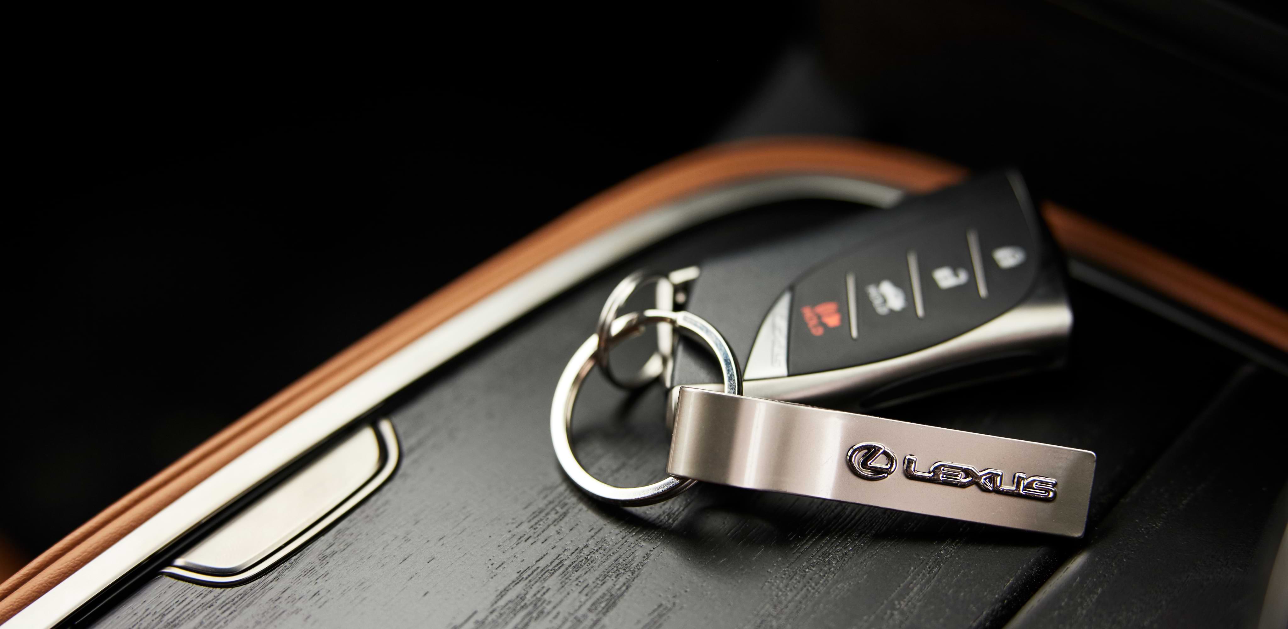 Lexus keys and an attached keyring.